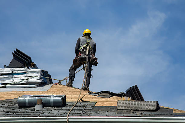 Professional Roof Replacement technician working in Brevard, NC